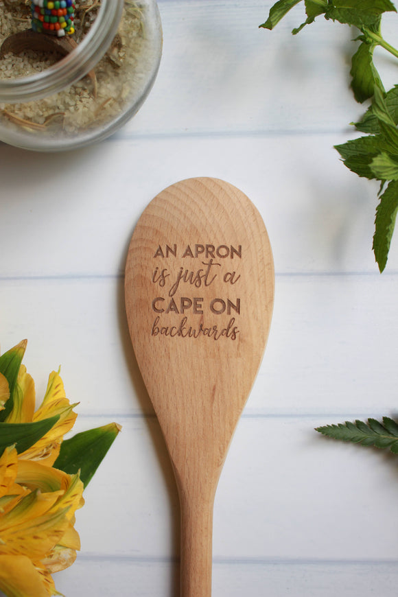 An Apron Is Just A Cape On Backwards Wooden Spoon